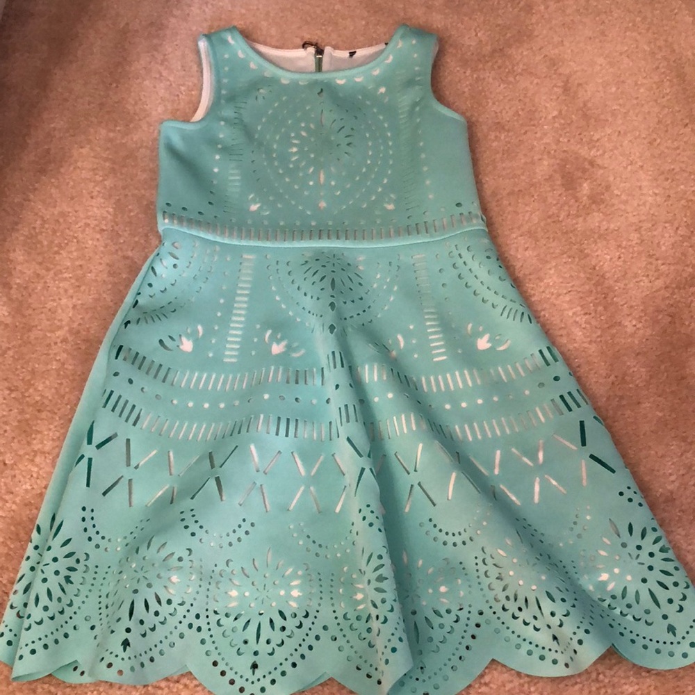 Turquoise cut out dress.